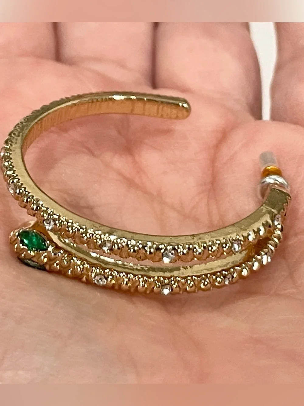 Gold Sparkle Snake Hoop Earrings with Green Eye Stone Accents